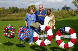 Pictured with some of the wreaths before ceremony Michael's Mom, Michael Boyd, CA Society & Joyce Armstrong