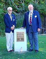 Chapter President Duane Booth & Secretary General McCarl pause for a camera shot at the Chapter's monument.