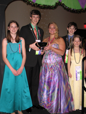Congratulations to the Schuyler Society, C.A.R. which was voted the most outstanding society in America at the C.A.R. National Convention that was recently held in Virginia.  Society President Nicholas Oxaal is pictured receiving the engraved silver bowl from  National Society President Caitlin Collins. Nicholas' siblings Elizabeth, Christopher and Alexandria  smile with pride and rightly so! The Schuyler Society also won several other prizes and Benjamin Gallant's prayer in honor of our veterans was read at Friday night's opening session.  The members of the Schuyler Society worked hard to win these awards and our chapter along with the Peter Gansevoort Chapter, NSDAR and the Rhodes Memorial Fund are very proud to sponsor them.