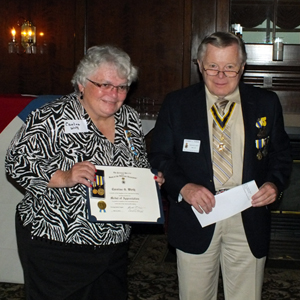 Chapter President Thomas L. Dunne presents Tawasentha Chapter, NSDAR member Caroline G. Wirth with the SAR Daughters of Liberty Award at their Annual Meeting which was held at the Albany Country Club in Voorheesville, NY. Mrs. Wirth has enrolled sons Garrett A. and Carl D. Wirth and grandsons Carl J. Wirth and Christopher A. Lavigne in our chapter. Past Chapter President & current State President Duane Booth and Historian Karl L. Danneil and wife Eleanor Morris were in attendance. Duane gave a presentation about the SAR to the DAR chapter members. Photo courtesy of Karl Danneil