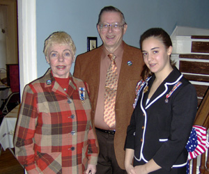 (l-r) Maj. Eleanor L. Morris, USA (Ret.), a member of Gen. Peter Gansevoort Chapter who served in-country with the National Guard during the 1st Gulf War, with husband Karl Danneil who is a US Army veteran of the Viet Nam War pose with Schuyler Society President Lexi Zerrillo