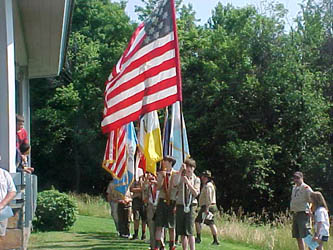 Members and leaders of Boy Scout Troop 6 presenting the colors