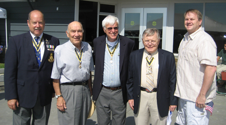 Early arrivals gather for a photo op: Tim Mabee, John Sheaff, Duane Booth, Tom Dunne and Tim Condon