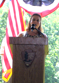 Vocalist Danielle McMullen sings the Star Spangled Banner