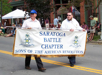 The author, Dennis Booth (L) and Ray LeMay carry the Chapter Banner