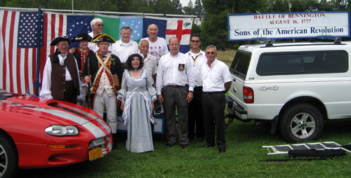 Saratoga Battle Chapter plus wosar, and Walloomsac Chapter SAR after the Turning Point parade - back row (l-r) Duane Booth, Thomas Dunne, Walloomsac Battle Chapter President John Sheaff, middle row (l-r)Andrew Companion, R. Harry Booth, Primitivo Africa; front row(l-r) Karl Danneil, Michael Companion, Eleanor Morris, Tim Mabee, Pat Festa - Photo by Jim Sullivan