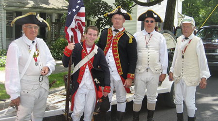 Re-enactors from the 2nd Continental Artillery - (L-R) Al Bartlett, Andrew and Mike Companion, Bret Trufant and Jim Hilton in the parade staging area