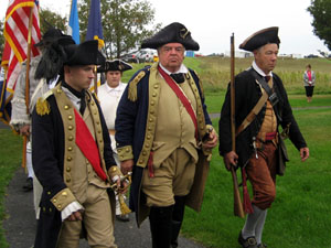 General Horatio Gates (center) leads his troops