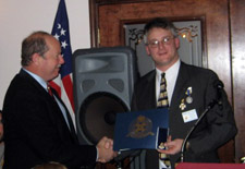 Tim receiving a 20 year award - Photo by Duane Booth