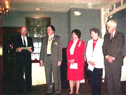 Past President Lewis O. Slocum escorts the candidates forward for installation.  Canidates L to R - Dennis F. Marr, Registrar; DAR Diane Fullam as proxy for son Richard H. Fullam, Treasurer; DAR Alice Goebel as proxy for son Jonathan E. Goebel, Vice President/Secretary, and Duane Booth, President.