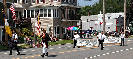 The SAR on the parade route. L to R Primitivo Africa, Douglas Gallant, Pat Reilly, Tim Mabee, Harry Booth, Duane Booth